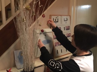 Diagrama Foundation: One of the Cabrini House residents decorating the house.