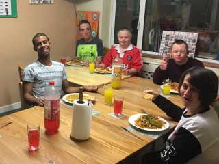 Diagrama Foundation: The residents of Cabrini House enjoying their Chinese takeaway.